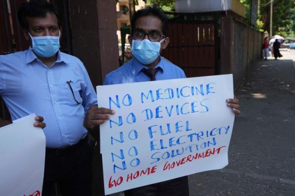 Sri Lankan government medical officers protest outside the natio<em></em>nal hospital in Colombo