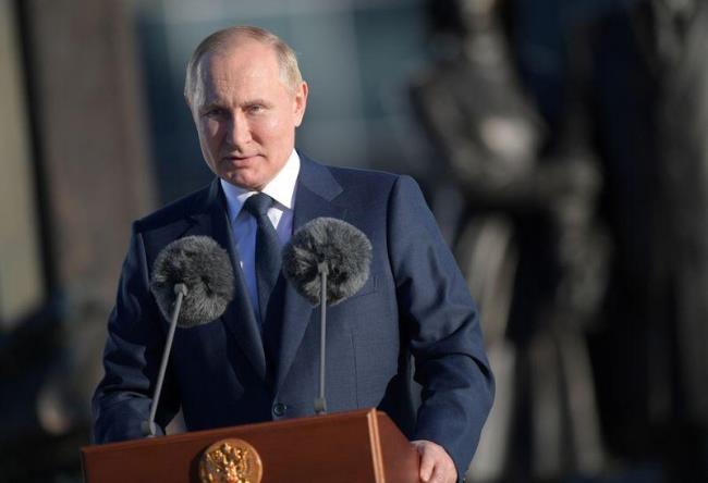 Russian President Vladimir Putin gives a speech near the headquarters of Russian Foreign Intelligence Service in Moscow