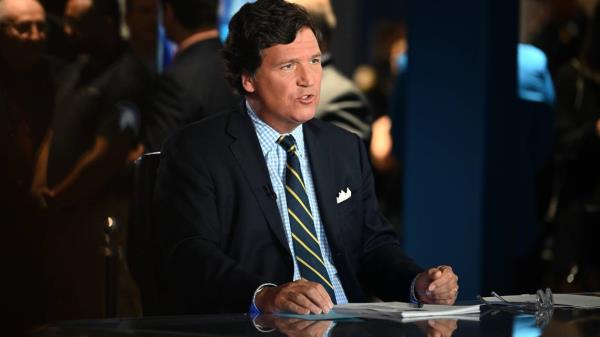 HOLLYWOOD, FLORIDA - NOVEMBER 17: Tucker Carlson speaks during 2022 FOX Nation Patriot Awards at Hard Rock Live at Seminole Hard Rock Hotel & Casino Hollywood on November 17, 2022 in Hollywood, Florida. (Photo by Jason Koerner/Getty Images)