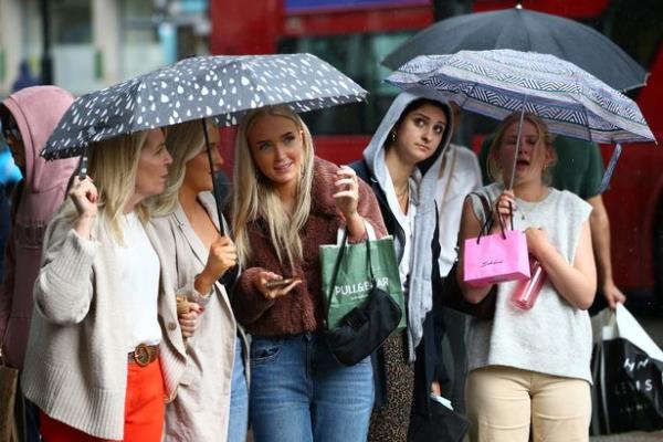 The warm weekend will be blighted by rainy spells, forecasters say (stock)