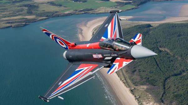 An RAF Typhoon was captured over the Menai Straits as it called past RAF Valley, wher<em></em>e all future RAF fast jet pilots are trained. ..The Typhoon Display Team deployed to the Midlands from their home ba<em></em>se at RAF Coningsby, to undertake air displays at RAF Shawbury and the Blackpool Air Show.