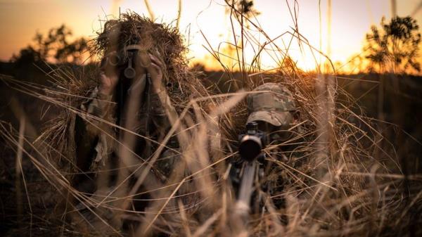 A spotter and sniper team of Support Company, 1st Battalion (1RGR) The Royal Gurkha Rifles, look through their sights and take cover to look o<em></em>nto enemy positions within their OP (observation point)...Soldiers from C Company 1st Battalion (1RGR) The Royal Gurkha Rifles ba<em></em>sed in Brunei are deployed in the Northern Territory of Australia taking part in Exercise Pacific Kukri, a multi-natio<em></em>nal joint exercise with the Australian Defence Force and U.S Marine Corps...Pacific Kukri is a 5 week deployment and gives the opportunity for 1RGR to undertake defence engagement activities by developing interoperability between the Australian Defence Force & US Marines enhancing relatio<em></em>nships within the IAP (Indo-Pacific Asia)....