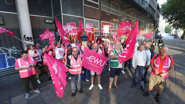 Postal workers from the Communication Workers Unio<em></em>n (CWU) on the picket line at the Royal Mail Whitechapel Delivery Office in east London. More than 100,000 postal workers are due to walk out on Friday in a dispute over pay, in what is being described as the biggest strike of the summer so far. Picture date: Friday August 26, 2022.