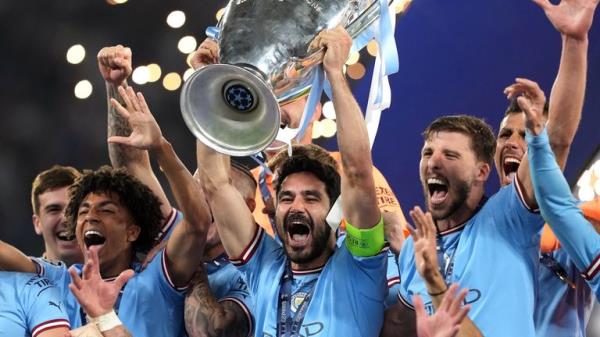 Manchester City's Ilkay Gundogan lifts the UEFA Champions League Trophy