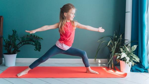 Not o<em></em>nly are children developing coordination, flexibility and body awareness, yoga allows children to tap into the natural world. Photo: Getty Images