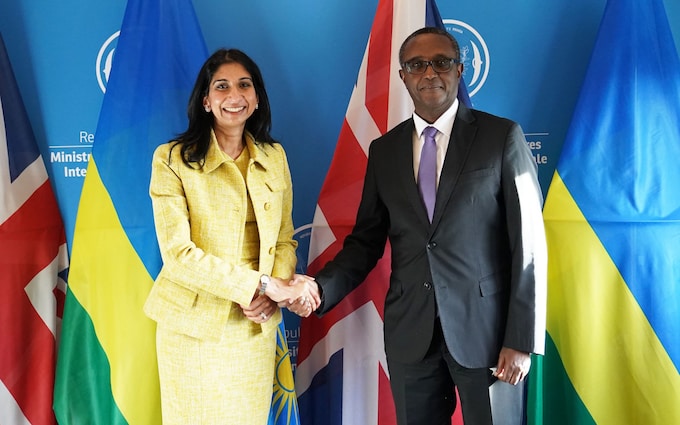Home Secretary Suella Braverman shakes hands with Rwandan minister for foreign affairs and internatio<em></em>nal co-operation, Vincent Biruta in Kigali, during her visit to Rwanda.