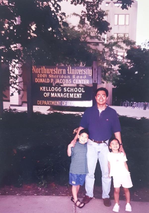 Adif (centre) with his children during his time at the Kellogg School of Management at the Northwestern University in 2001.