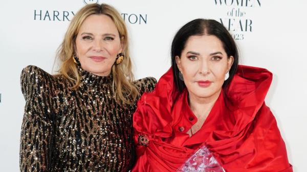 Marina Abramovic with the Artist of the Year award, presented by Kim Cattrall (left),   at  the Harper's Bazaar Women of the Year 2023 awards at Claridges, London. Picture date: Tuesday November 7, 2023. PA Photo. Photo credit should read: Ian West/PA Wire 