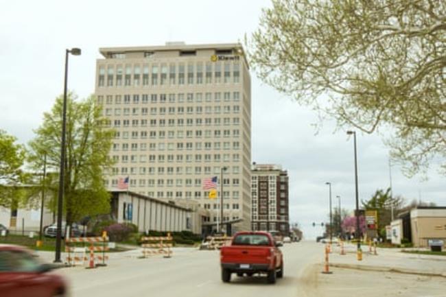 High-rise building standing alone in midwestern downtown.