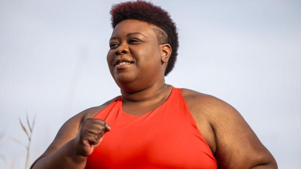 A woman jogging.