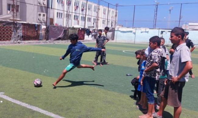 Mohammed Abu-Hujair takes a shot at goal at Al-Salah FC in Deir al-Balah