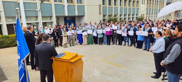 UNRWA staff in Amman, Jordan, attend a ceremony to remember colleagues who have lost their lives in Gaza. 