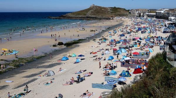 A general view of Porthmeor Beach during hot weather in St Ives, Cornwall, Britain, August 7, 2022. REUTERS/Tom Nicholson