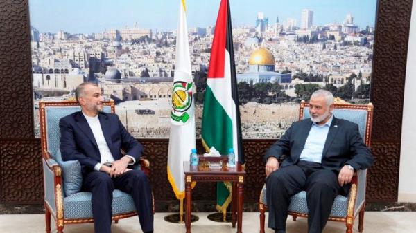 Iran's Foreign Minister Hossein Amir Abdollahian meets with Palestinian group Hamas' top leader, Ismail Haniyeh in Doha, Qatar October 14, 2023. Iran's Foreign Ministry/WANA (West Asia News Agency)/Handout via REUTERS ATTENTION EDITORS - THIS IMAGE HAS BEEN SUPPLIED BY A THIRD PARTY. ATTENTION EDITORS - THIS PICTURE WAS PROVIDED BY A THIRD PARTY