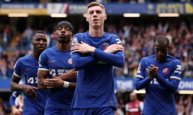 Cole Palmer celebrates scoring for Chelsea.