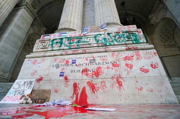 Red handprints left on the New York Public Library in Manhattan by anti-Israel protestors on November 23, 2023.