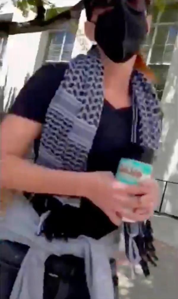 A woman blocking access to the UC Berkeley, encampment allegedly punched a Jewish student in the face as he tried recording the protest.