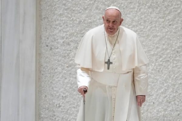 Pope Francis arrives to meet students and teachers of the School of Peace network in the Paul VI Hall at the Vatican, Friday, April 19, 2024. (AP Photo/Andrew Medichini)
