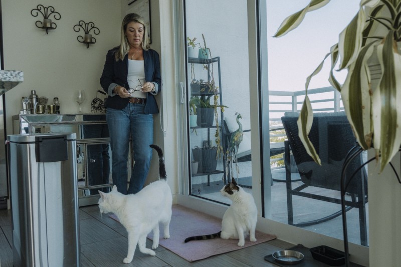 Legal tech co<em></em>nsultant and speaker Melissa Rogozinski in her apartment, with her two cats, Buddy and Sweet Girl. Fort Lauderdale, Fla. April 24, 2024.