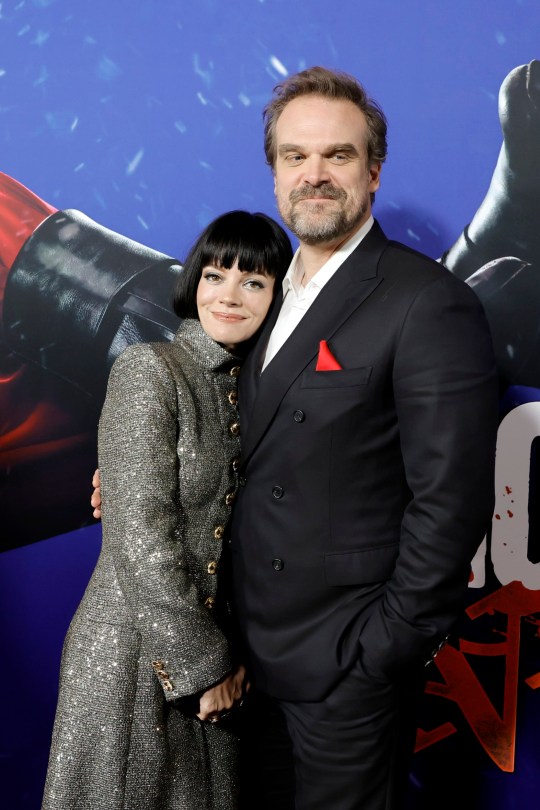 Lily Allen hugs her husband, David Harbour on the red carpet