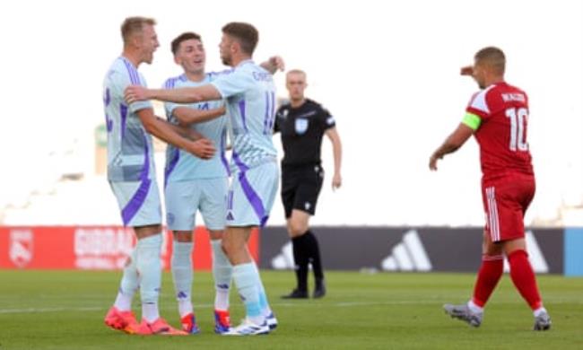 Ryan Christie is co<em></em>ngratulated by his teammates after netting the opener