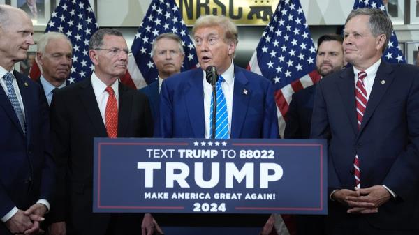 Former President Do<em></em>nald Trump, the presumptive GOP nominee, speaks with reporters at the NRSC on June 13, 2024, in Washington, D.C.