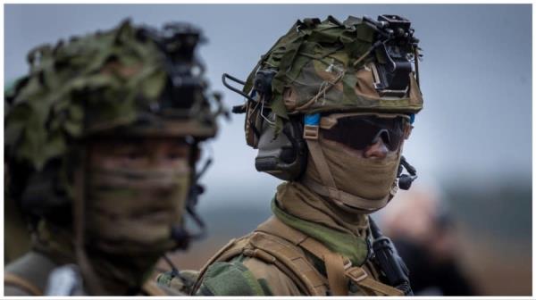 Soldiers of the Norway Army take part in the NATO military exercise ‘Iron Wolf 2022-II’ at a training range in Pabrade, north of the capital Vilnius, Lithuania on Wednesday, Oct. 26, 2022. (AP Photo/Mindaugas Kulbis)