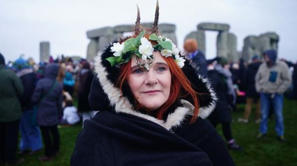 People take part in the winter solstice celebrations at the Sto<em></em>nehenge prehistoric mo<em></em>nument on Salisbury Plain in Wiltshire. Picture date: Friday December 22, 2023. PA Photo. Photo credit should read: Ben Birchall/PA Wire