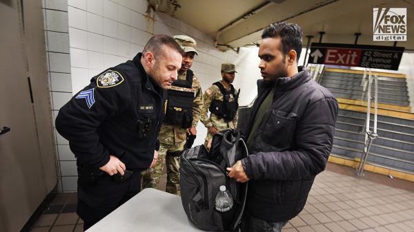 NYPD officers spring into action to save man from subway tracks