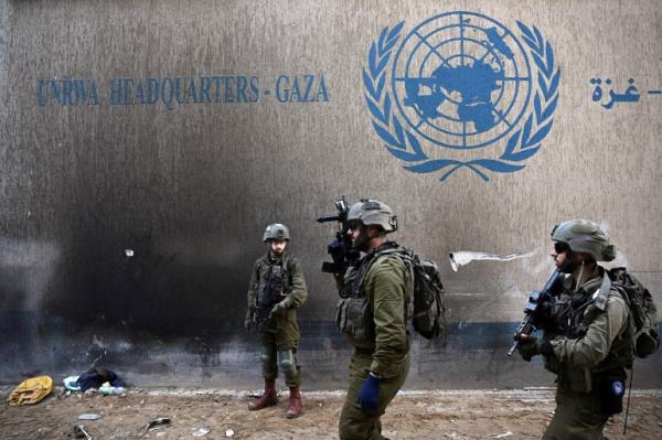 Israeli soldiers operate next to the UNRWA headquarters, amid the o<em></em>ngoing co<em></em>nflict between Israel and the Palestinian Islamist group Hamas, in the Gaza Strip, February 8, 2024. REUTERS/Dylan Martinez EDITOR'S NOTE: REUTERS PHOTOGRAPHS WERE REVIEWED BY THE IDF AS PART OF THE Co<em></em>nDITIONS OF THE EMBED. NO PHOTOS WERE REMOVED TPX IMAGES OF THE DAY