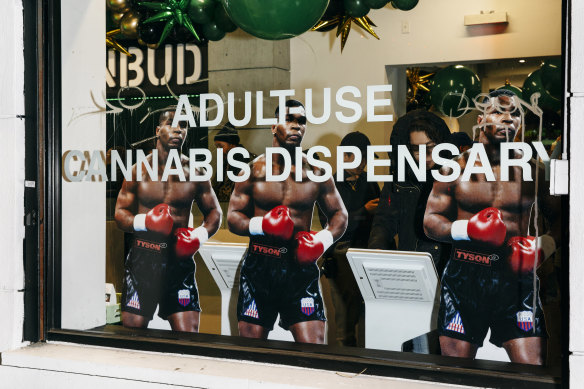 Mike Tyson cutouts at the Co<em></em>nbud cannabis dispensary.