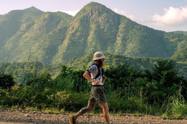 Rus Cook running in Africa