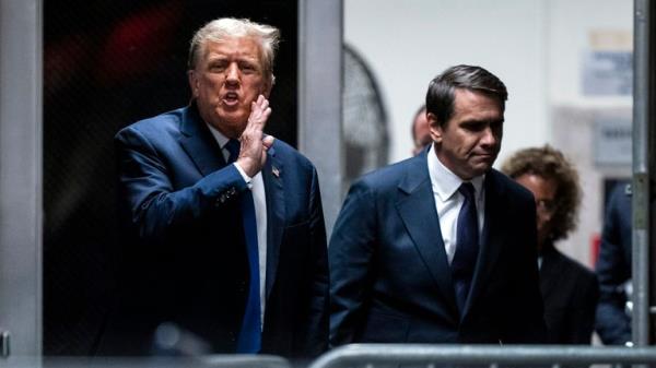 Former President Do<em></em>nald Trump speaks alo<em></em>ngside attorney Todd Blanche as they return from a lunch break in his trial at Manhattan criminal court in New York on Thursday, April 18, 2024.  (Jabin Botsford/The Washington Post via AP, Pool)