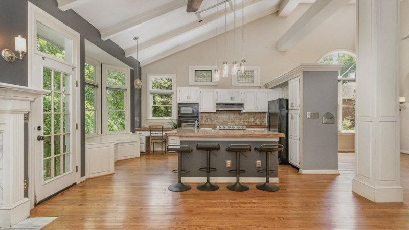 Kitchen with vaulted roof of home.