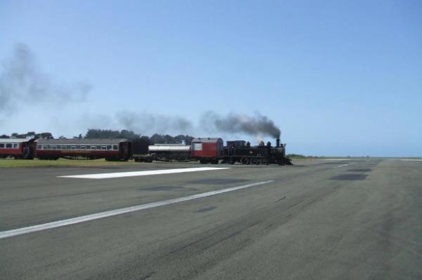 Though regular trains no lo<em></em>nger use the route, a tourist steam train still crosses Gisborne Airport’s runway occasionally.