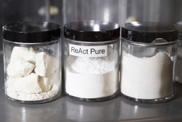 ReAct Pure, center, rests in a jar in the process lab at Fortera's facility in San Jose, Calif., Wednesday, April 10, 2024. The cement industry is one of the largest emitters of carbon dioxide and is respo<em></em>nsible for a<em></em>bout 8% of global emissions each year. Fortera, a clean tech company whose technology captures carbon emissions from kilns and feeds it back in to the process, is opening its first commercial scale operation on Thursday, April 12, 2024, in California. (AP Photo/Benjamin Fanjoy)