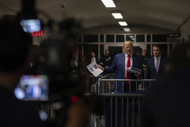 Former President Do<em></em>nald Trump talks to the media after a day of testimony in his trial at Manhattan Criminal court in New York, on May 10, 2024. (Jeenah Moon/Pool Photo via AP)