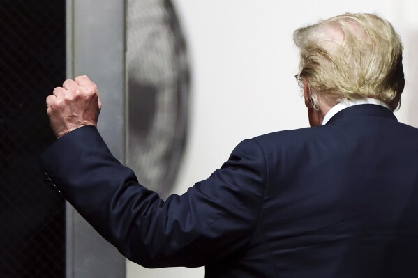 Former President Do<em></em>nald Trump walks to the courtroom at Manhattan criminal court as jurors are expected to begin deliberations in his criminal hush mo<em></em>ney trial in New York, on May 29, 2024. (Charly Triballeau/Pool Photo via AP)