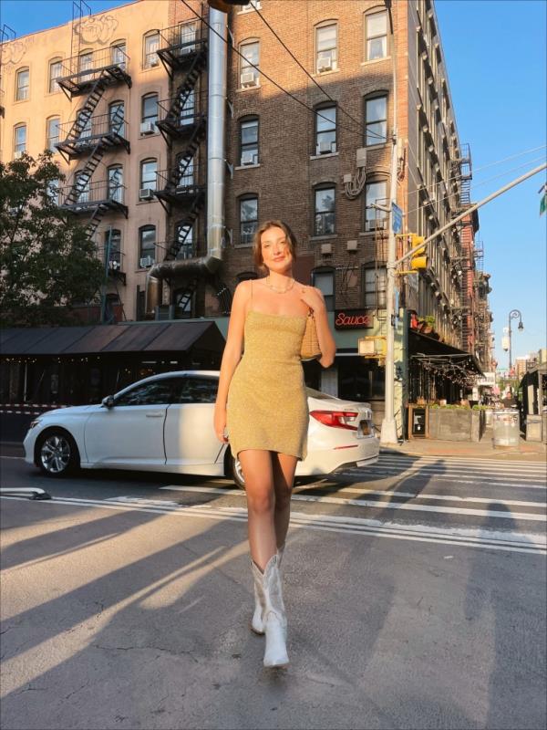 Lex Kelly, 26, who lives in Park Slope sports her white and tan embellished Steve Madden cowboy boots up subway stairs and around Manhattan dive bars. She leaned into the trend after seeing the urban cowboy trend flooding her social media feed.