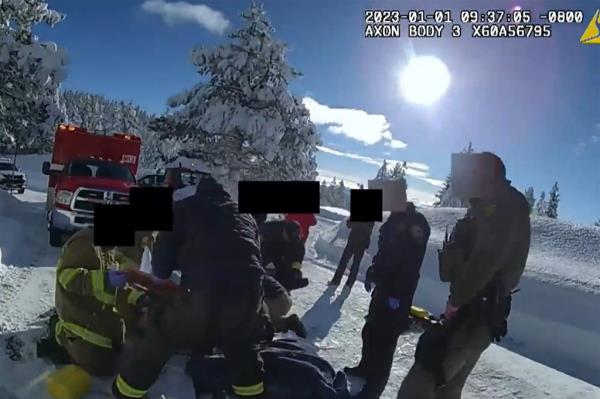 Emergency crews tend to Renner as they attempt to save his life following the accident on Jan. 1, 2023.