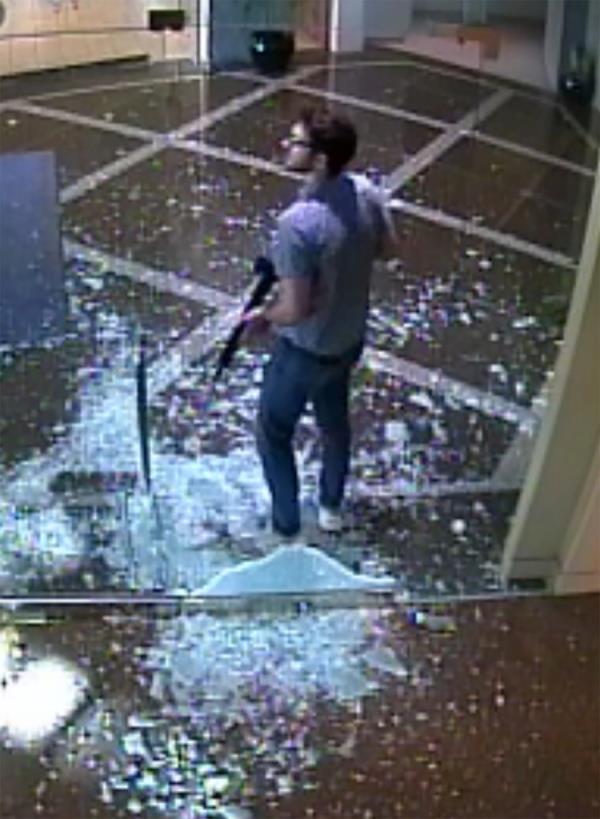 A still from surveillance video released by Louisville Police shows Co<em></em>nnor Sturgeon in the vestibule of Old Natio<em></em>nal Bank .