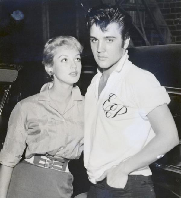 (Original Caption) 8/9/1957-Memphis, TN: Actress Venetia Stevenson poses with her host singer Elvis Presley, at his home here, Aug. 9. Venetia, daughter of actress Anna Lee and director Robert Stevenson and former wife of actor Russ Tamblyn, was another of Presley's Hollywood guests.