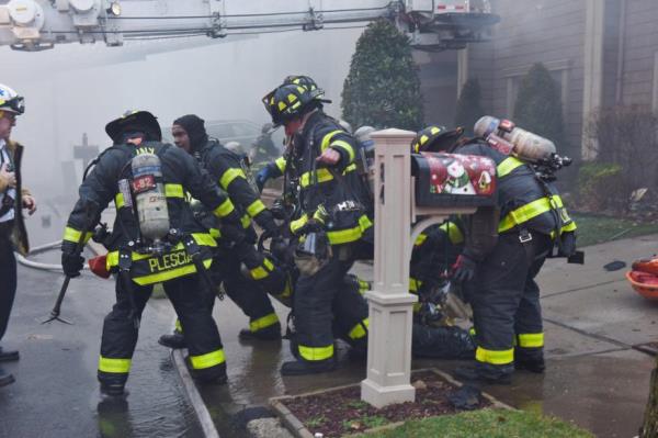 Firefighters respond to the scene of the fire.