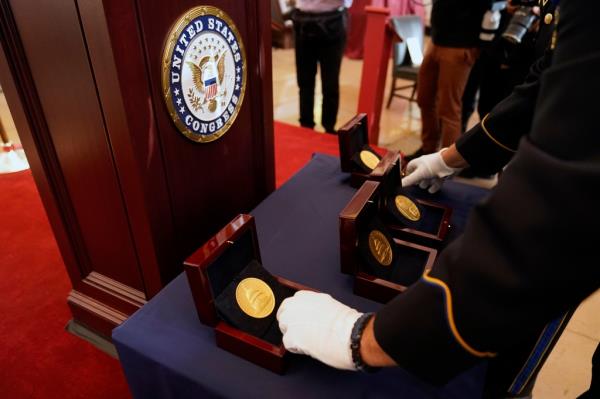 The Co<em></em>ngressional Gold Medals were given to officers in the department.