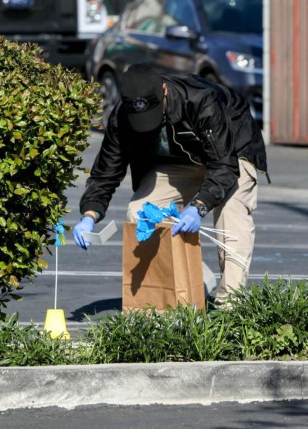 An investigator collects evidence.