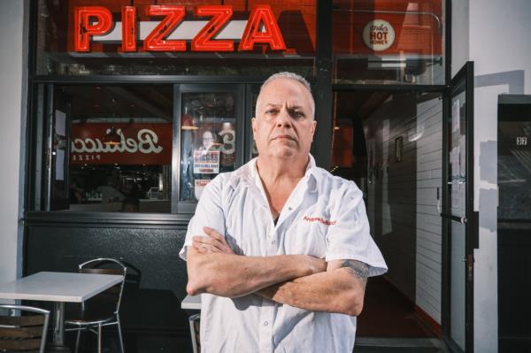 Andrew Bellucci started a new pizza shop just blocks away from the other joint.