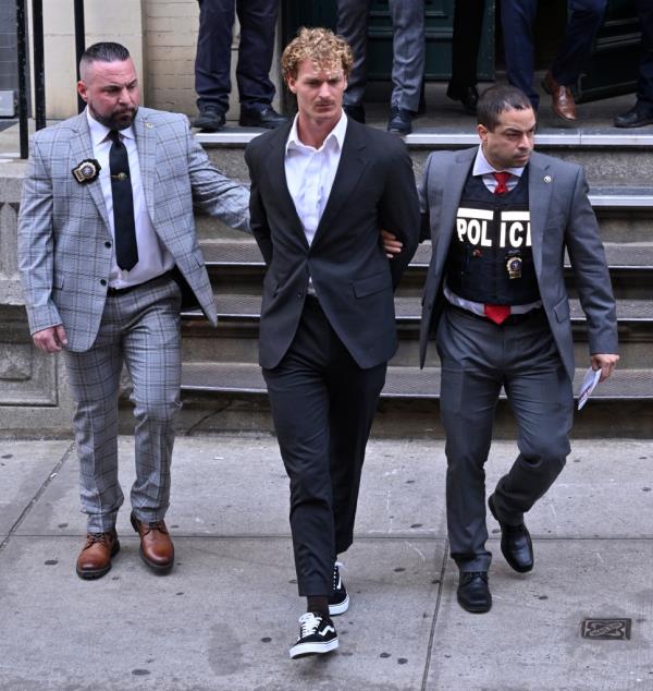 Ex-Marine Daniel Penny is seen coming from the 5th Precinct on Elizabeth Street.