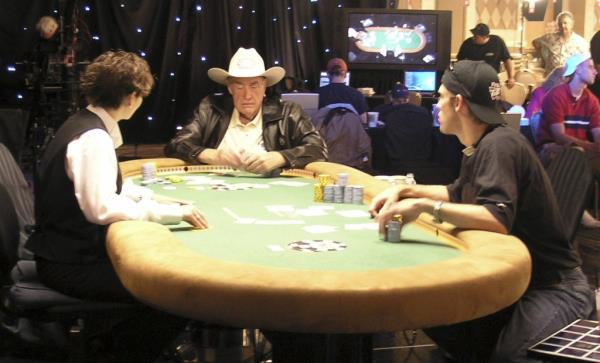 Doyle Brunson with models