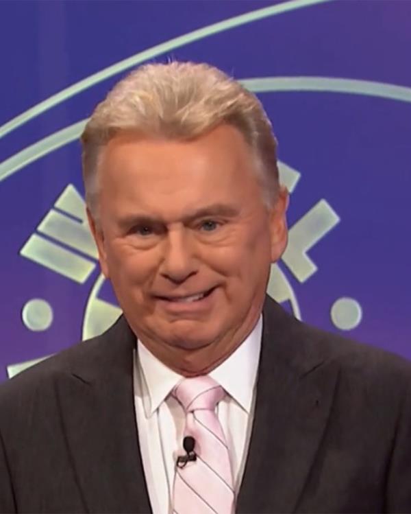 Sajak later apologized to Greg for pulling on his facial hair.