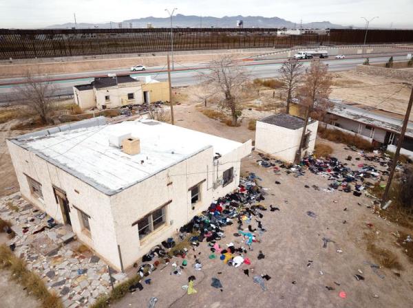 Discarded clothing, footwear and bags from migrants crossing the U.S.-Mexico Border Wall.